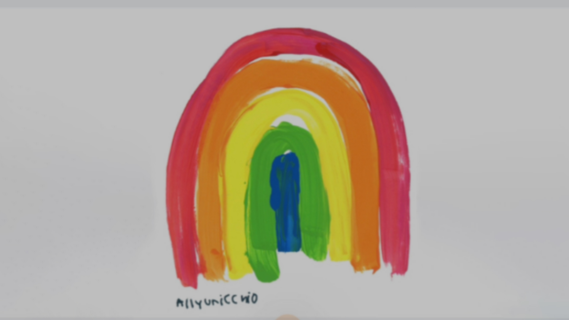 A colorful rainbow painted by an autistic artist.